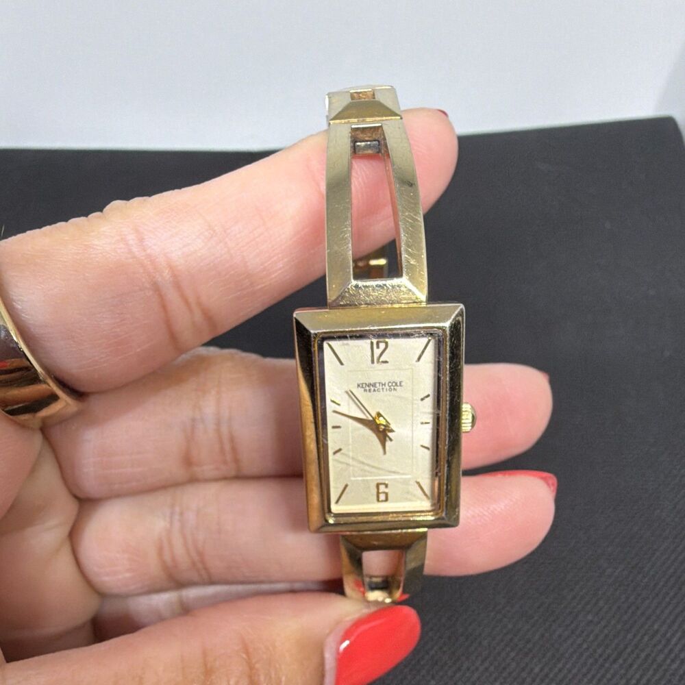Kenneth Cole Reaction Women’s Gold Tone Cuff Watch Rectangular Dial Quartz Watch